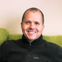 Headshot of Andrew Taylor